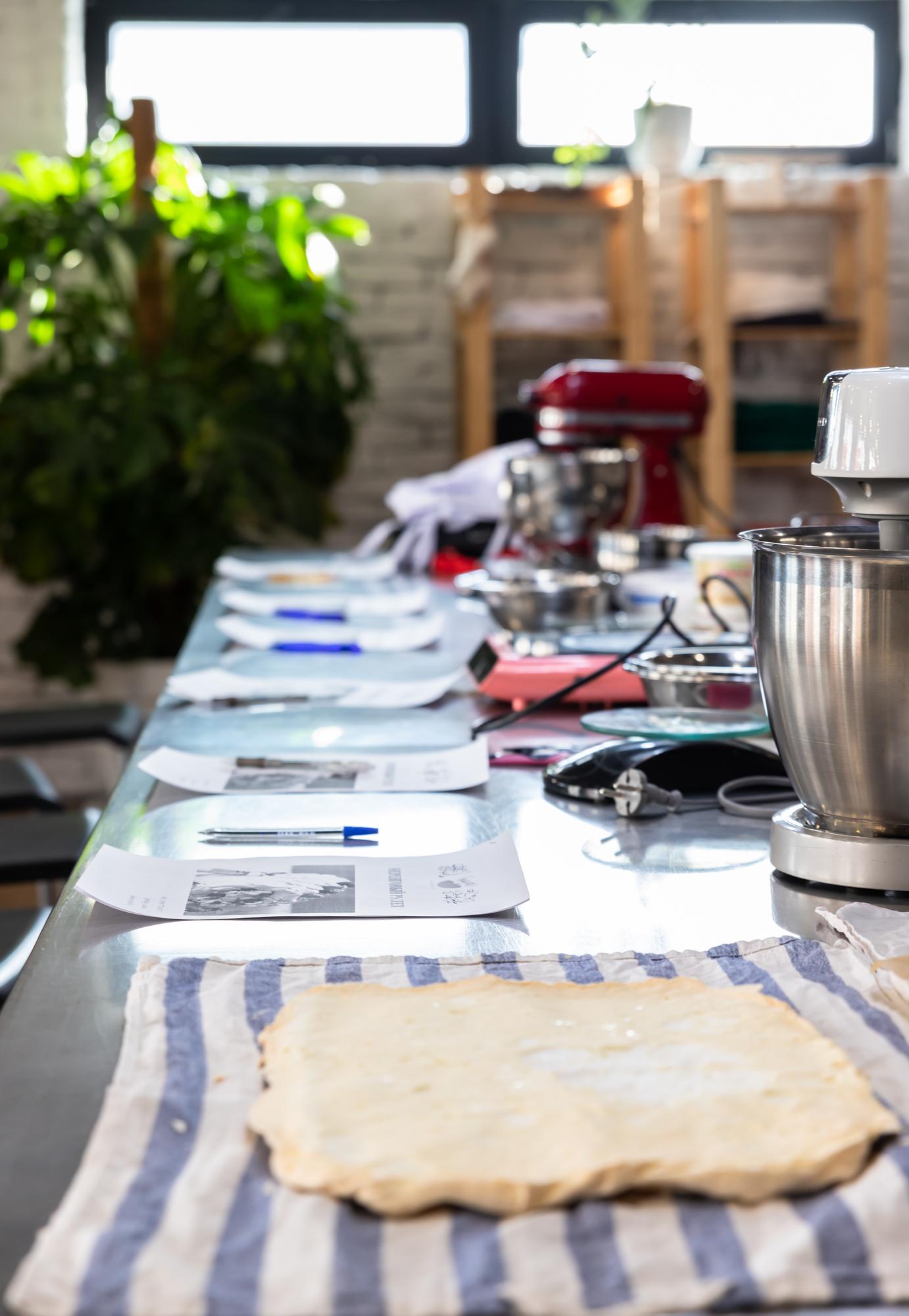 Workshop table with tools and ingredients laid out